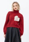 Gestickter Herz-Strickpullover mit Stehkragen in Rot