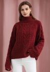 Rollkragenpullover mit Pailletten und Zopfmuster in Rot