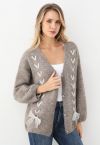 Flauschige Strickjacke mit Spitzenband und Schnürung in Taupe