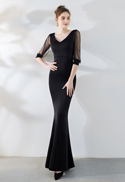 Kleid mit drapierten Ärmeln aus Mesh in Schwarz