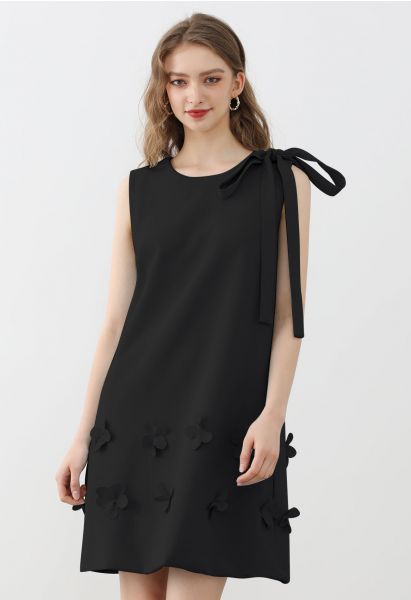 Ärmelloses Kleid mit Blumenapplikation und Schleife in Schwarz