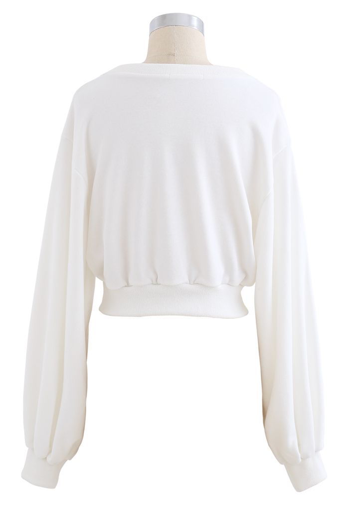 Kurzes Sweatshirt mit Puffärmeln in Weiß