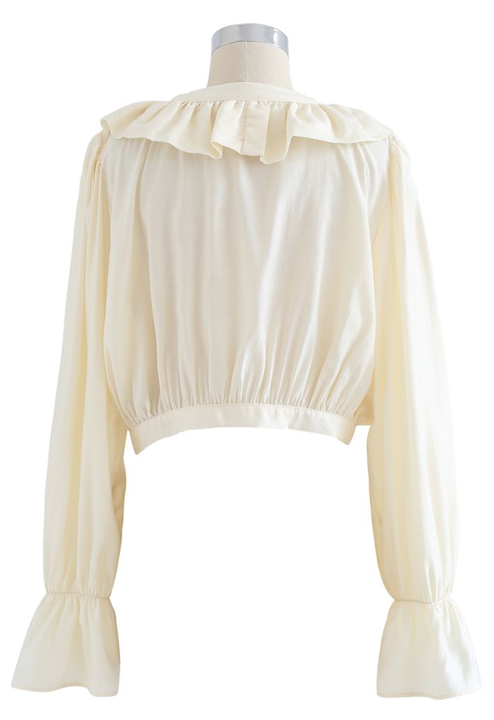 Buttoned Wrap Ruffle Crop Top in Creme