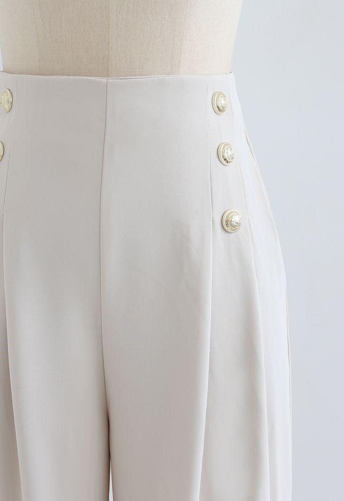 Golden Button verzierte plissierte Hose aus Elfenbein