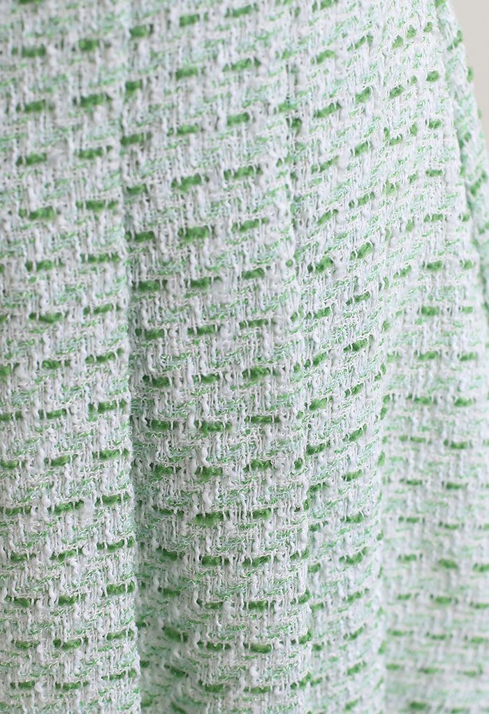 Grüner Tweed-Minirock mit Faltensaum vorn