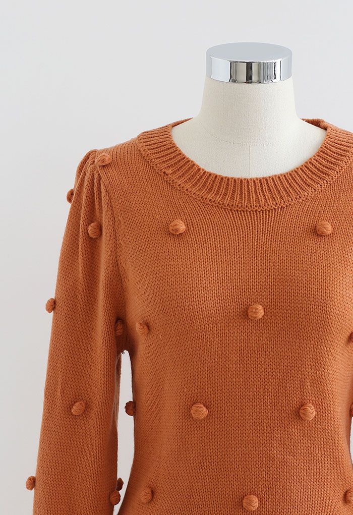 Pulloverkleid mit Puffärmeln und Pom-Pom in Orange