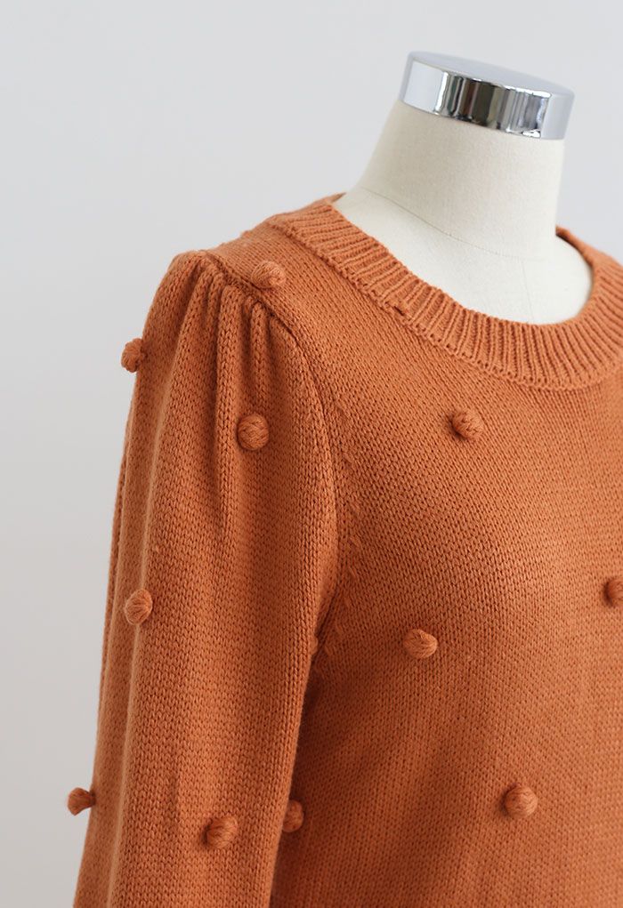 Pulloverkleid mit Puffärmeln und Pom-Pom in Orange