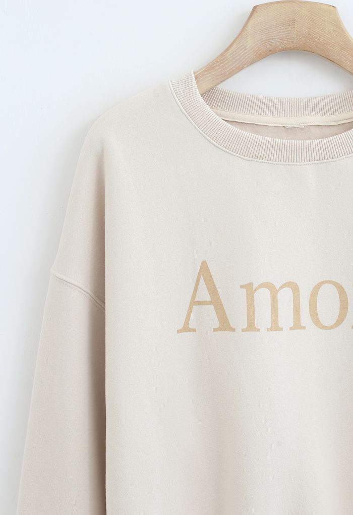 Amore Bedrucktes Fleece-Sweatshirt in Creme