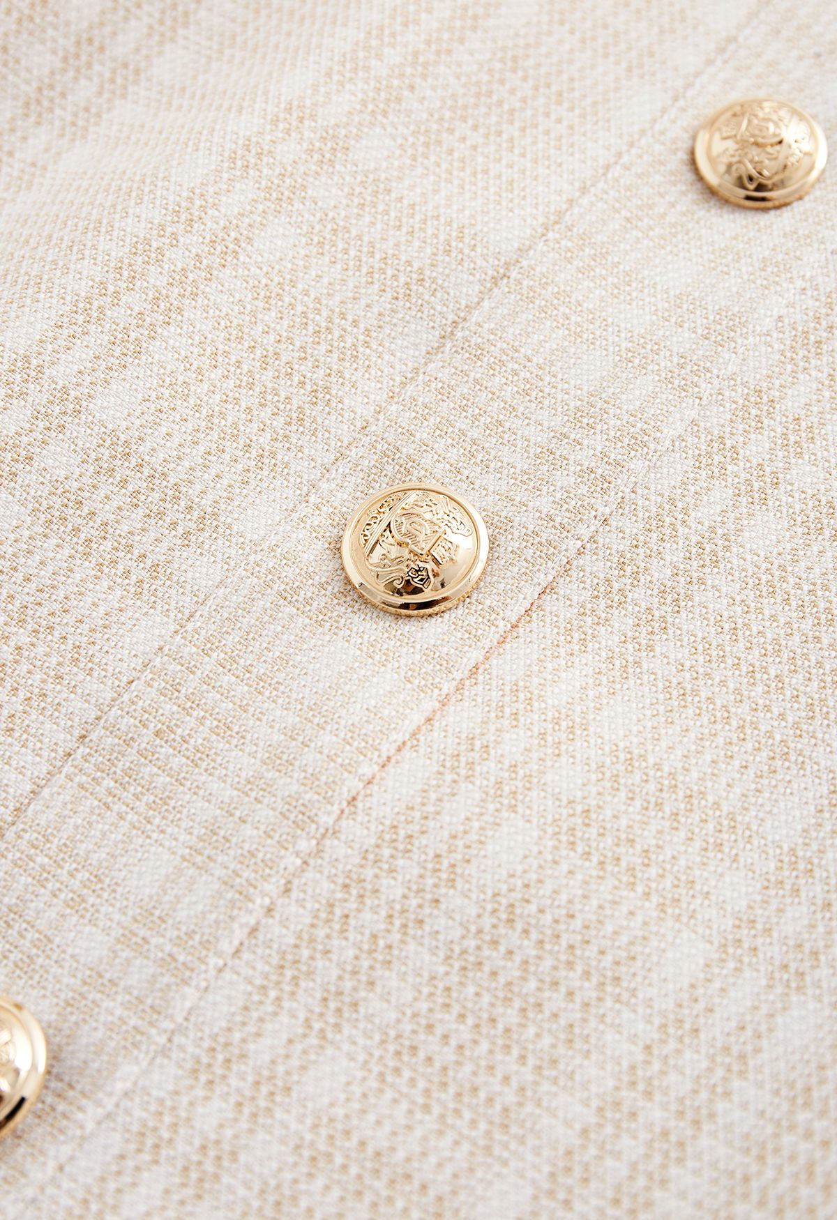 Falten-Midirock aus Tweed mit Knopfleiste und Karomuster in Apricot