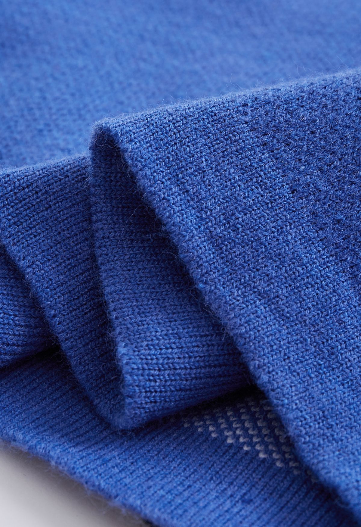 Zweireihiger Cardigan in Kontrastfarbe in Blau