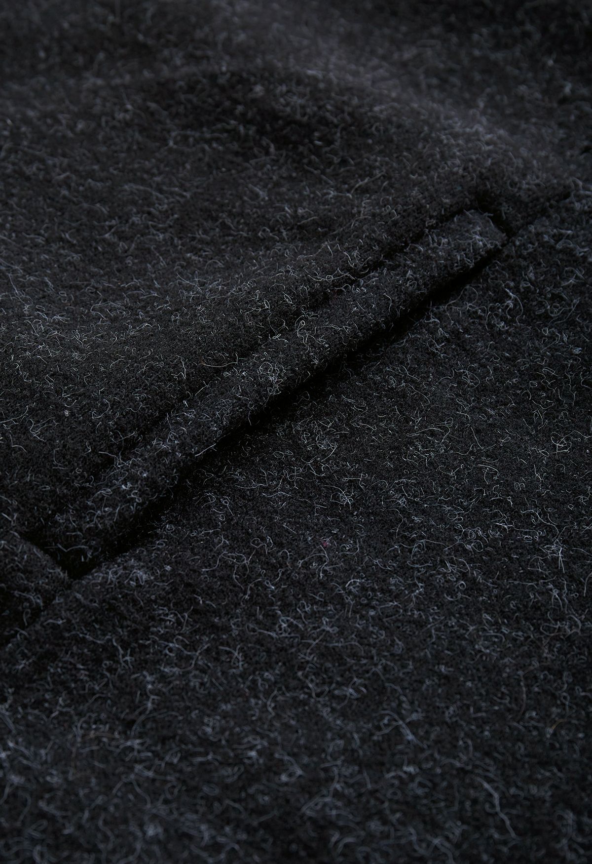 Kunstpelz-Poncho mit Schleife zum Selbstbinden in Schwarz