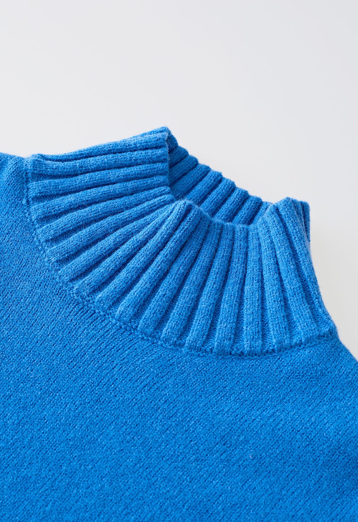 Pullover mit Stehkragen und geknöpften Manschetten und Strickhose im Set in Blau