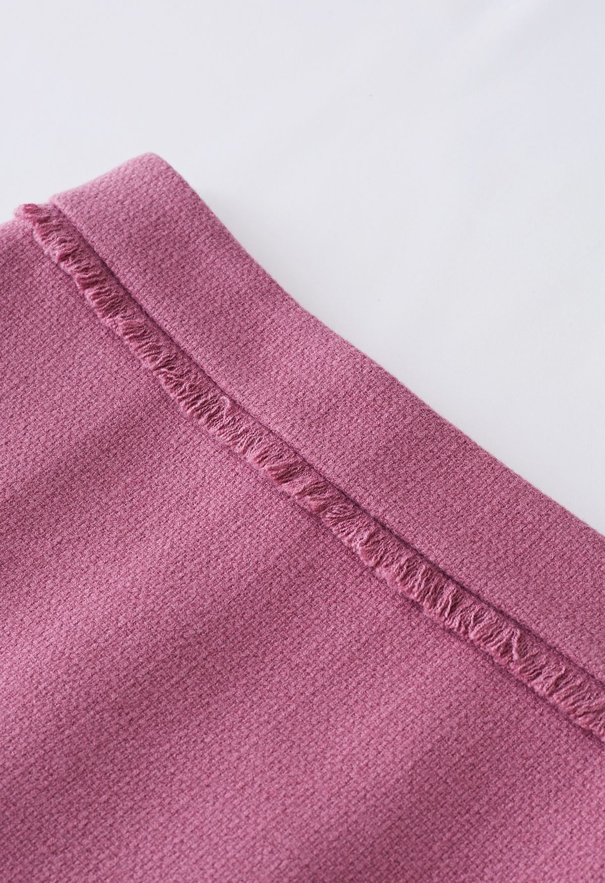 Knospenrock aus Tweed mit Fransenbesatz in Rosa