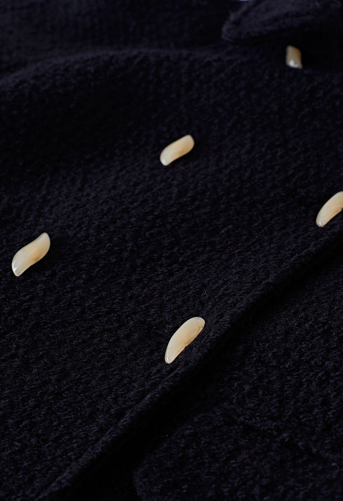 Mantel aus Wollmischung mit Pattentaschen in Schwarz