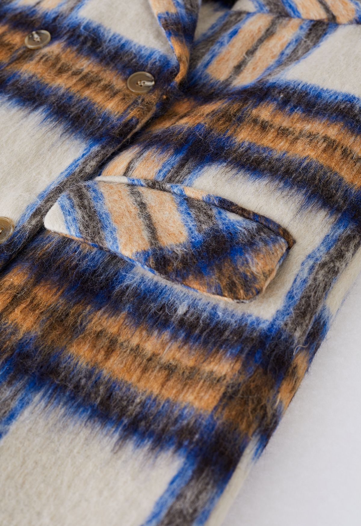 Langer Mantel aus Wollmischung mit Karomuster und spitzem Revers in Blau