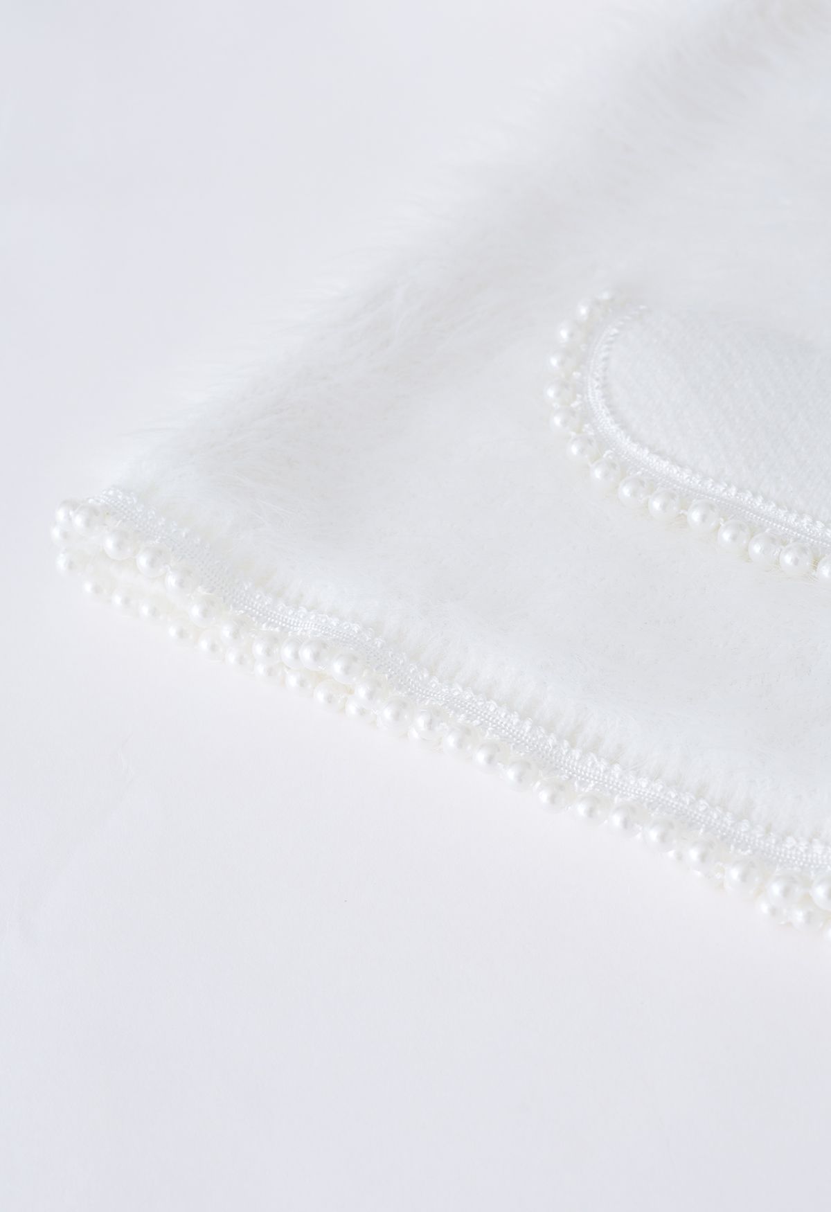 Perliger Kunstpelz-Strick-Cardigan in Weiß