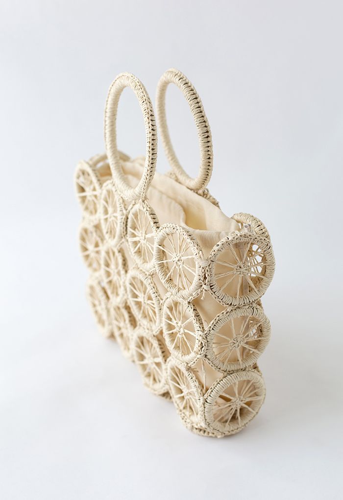 Radförmige Handtasche aus gewebtem Stroh in Creme