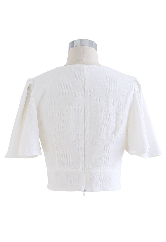 Crop-Top aus Baumwolle mit Flatterärmeln und Twist-Vorderseite in Weiß