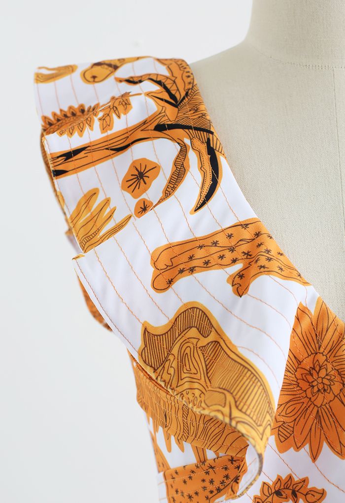 Goldener Badeanzug mit ägyptischem Muster und Rüschenbesatz