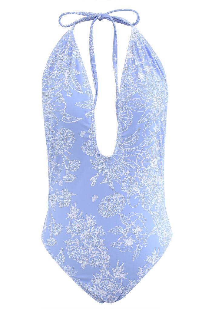 Badeanzug mit Blumenmuster und offenem Rücken in Blau