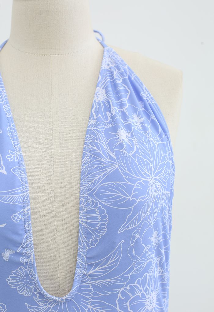 Badeanzug mit Blumenmuster und offenem Rücken in Blau