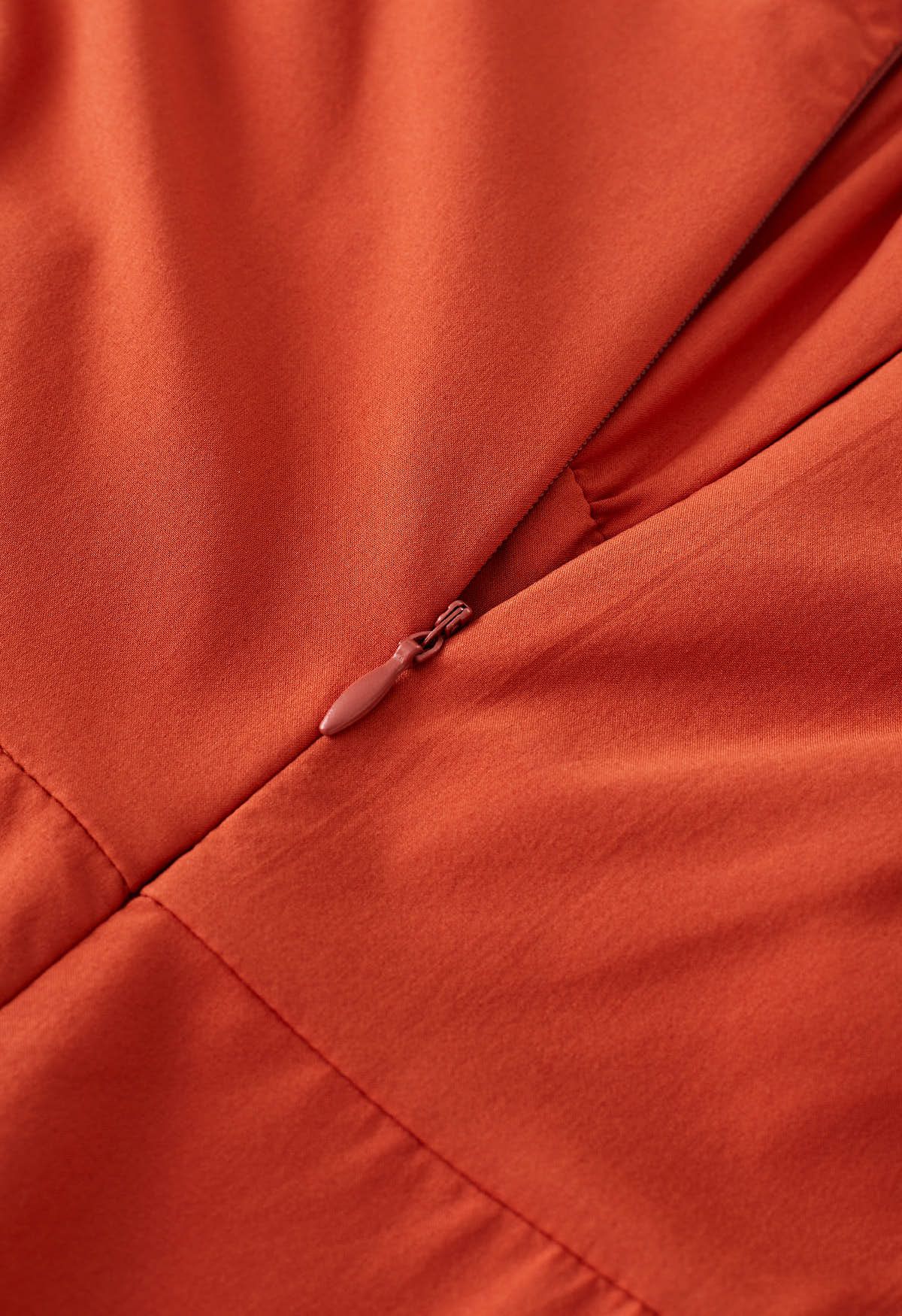 Luftiger, schulterfreier Crop-Jumpsuit mit Binderücken in Orange