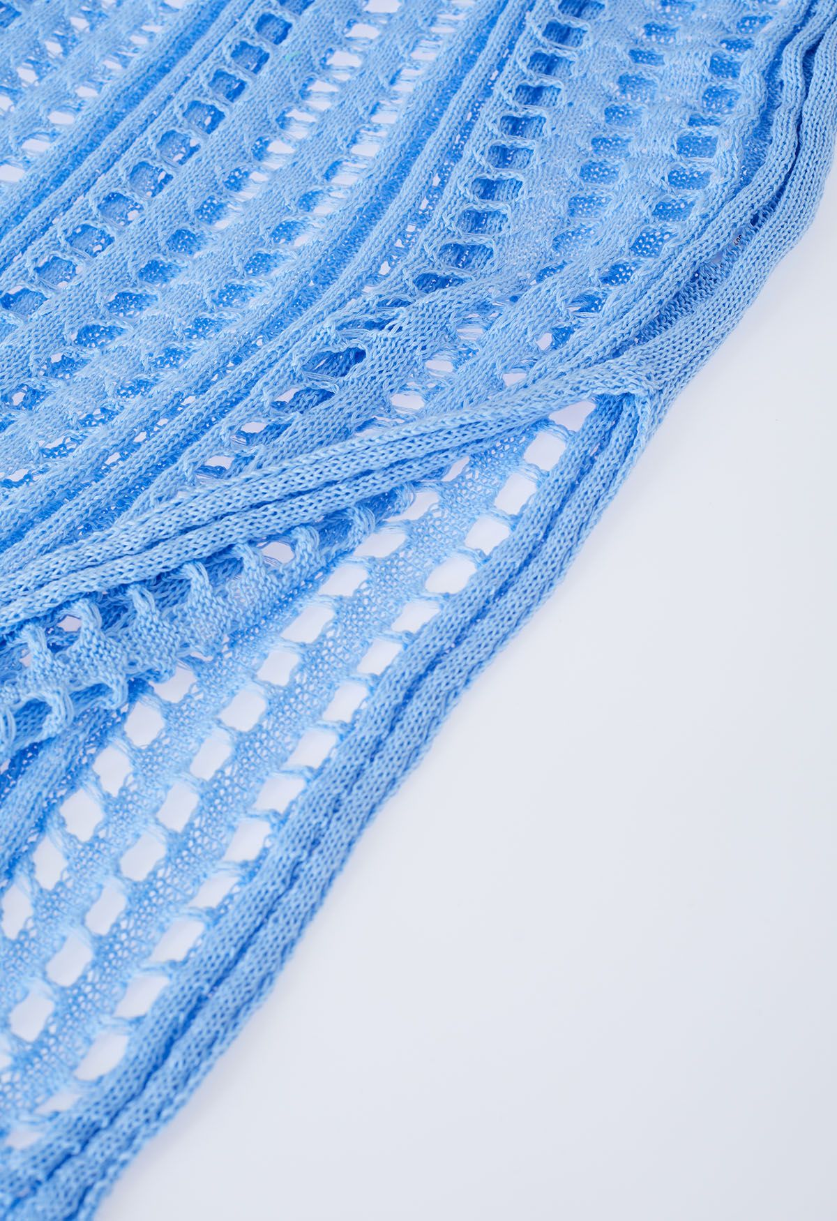Durchbrochener Strick-Cover mit seitlichem Schlitz in Blau