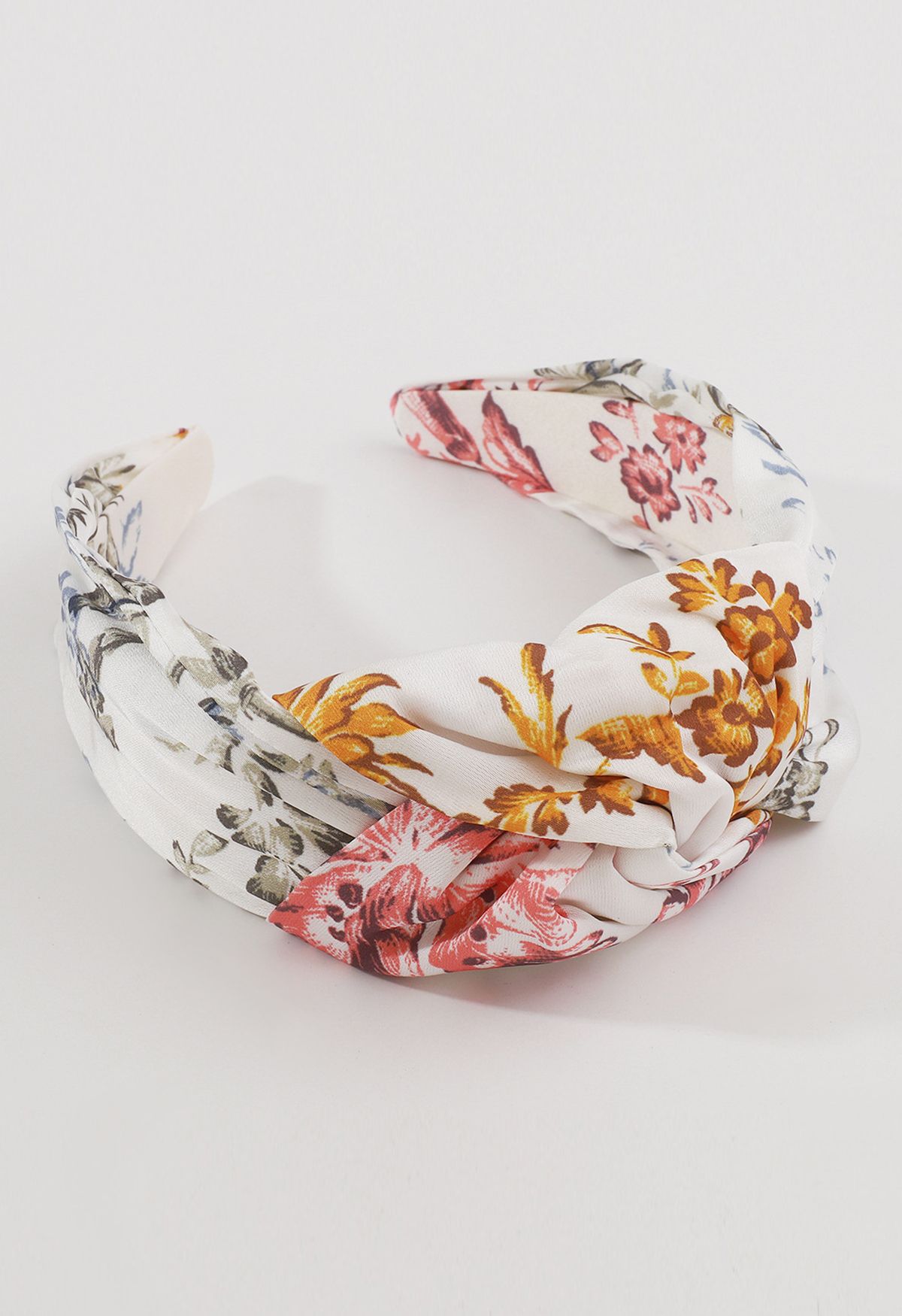 Geknotetes Stirnband mit Blumenmuster in Weiß