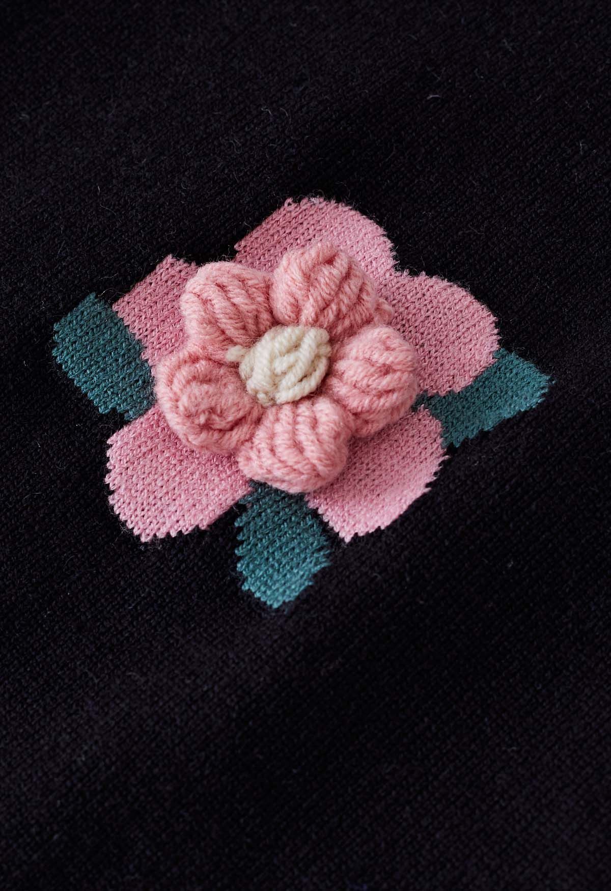 Rosafarbenes, kurzärmliges Strickoberteil mit Blumenmuster in Schwarz