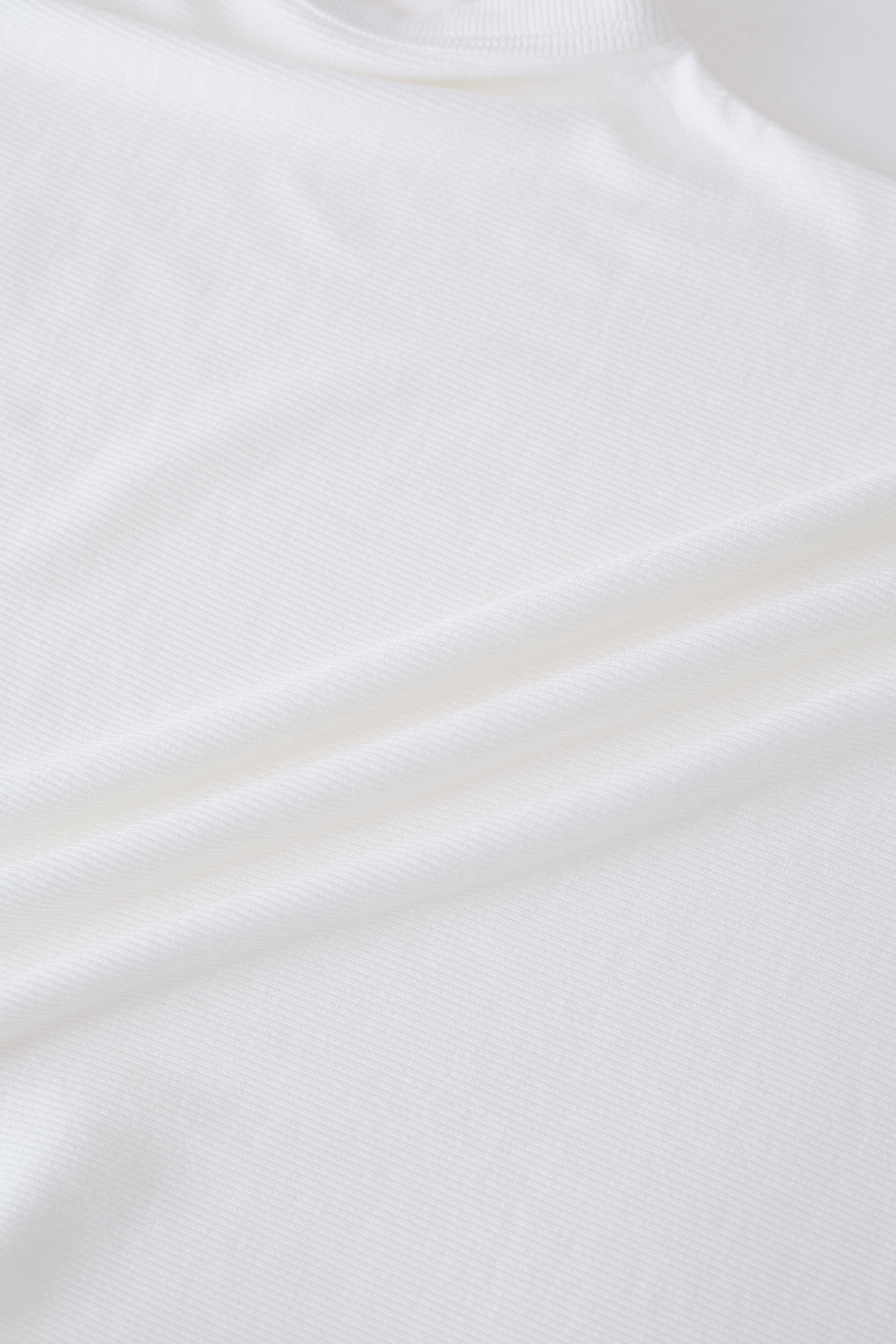 Elegantes Crop-Top aus Baumwolle mit Rundhalsausschnitt in Weiß