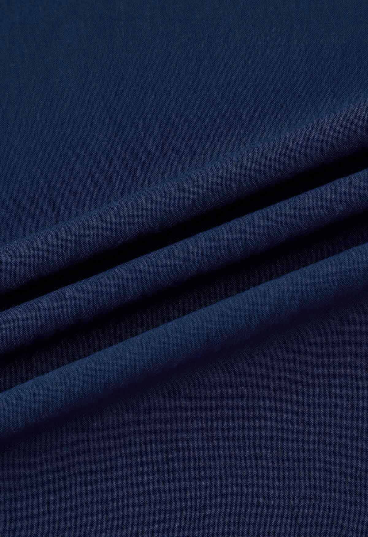 Cami-Kleid mit Rüschensaum und Schnürung an den Schultern in Marineblau