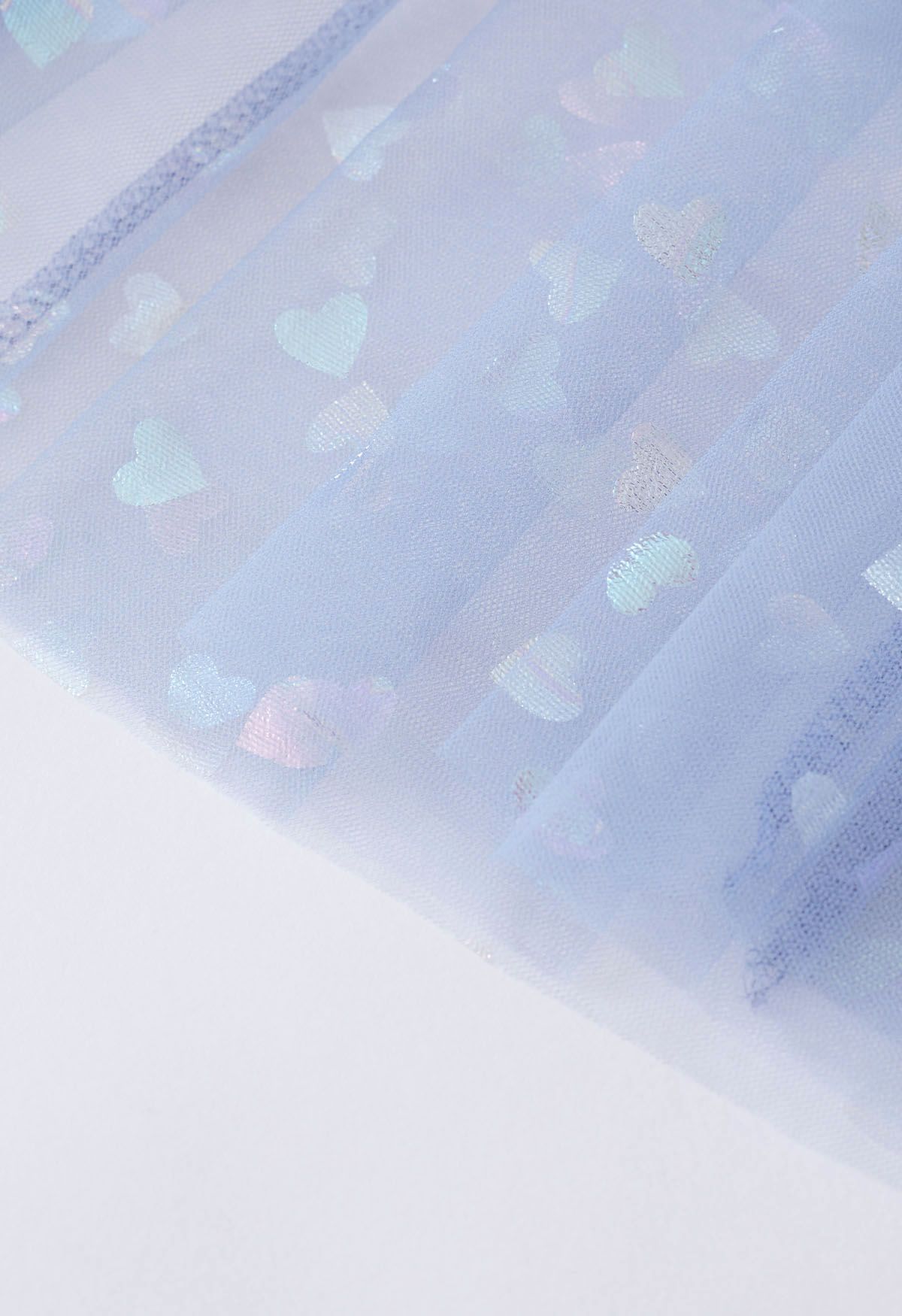Midirock aus Mesh-Tüll mit schillernden Herzen in Blau