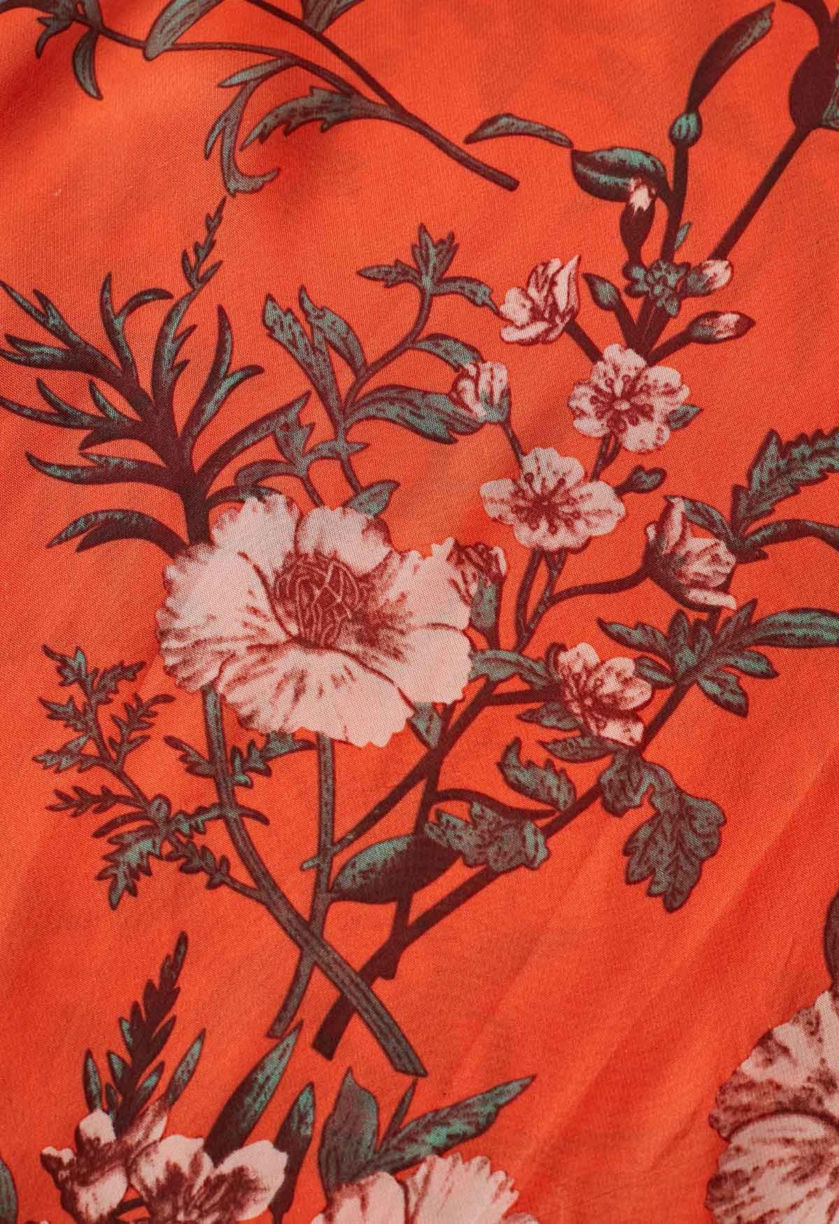 Orangefarbener Chiffon-Maxirock mit Blumenstrauß-Print