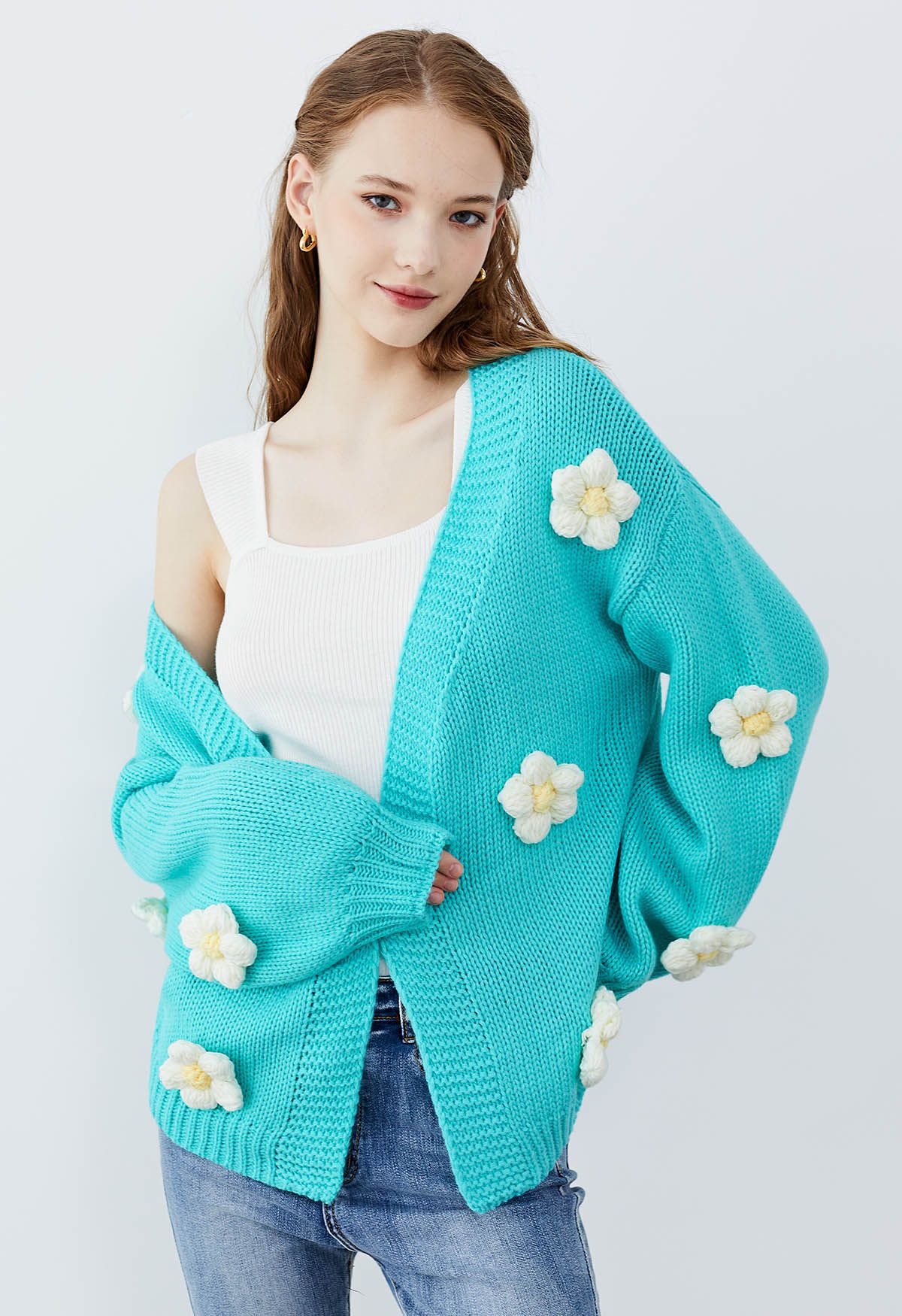 Vorne offener Strick-Cardigan mit 3D-Stich-Blume in Blau