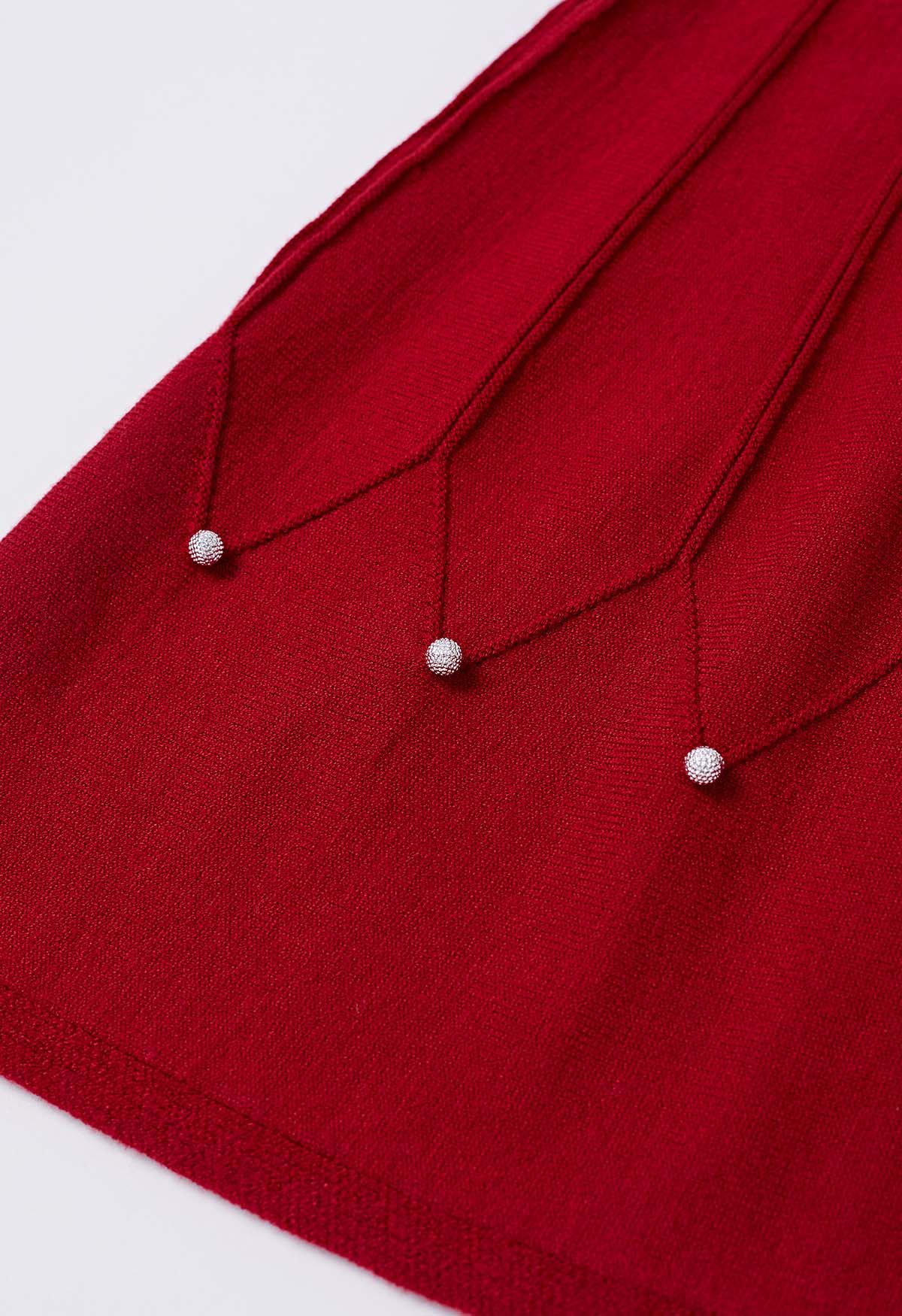 Strickrock mit silbernen Perlen und Nahtverzierung in Rot