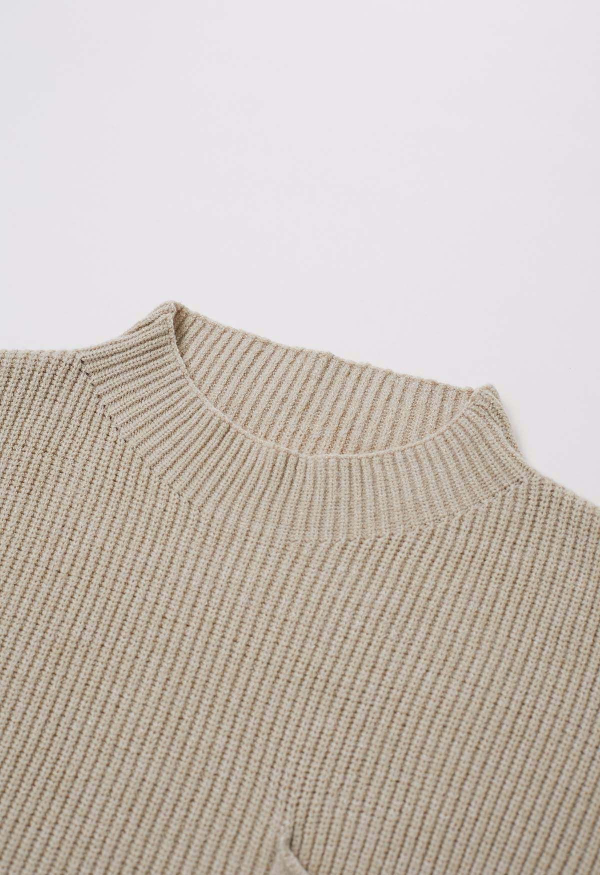 Gerippter Strickpullover mit aufgesetzten Taschen in Sand