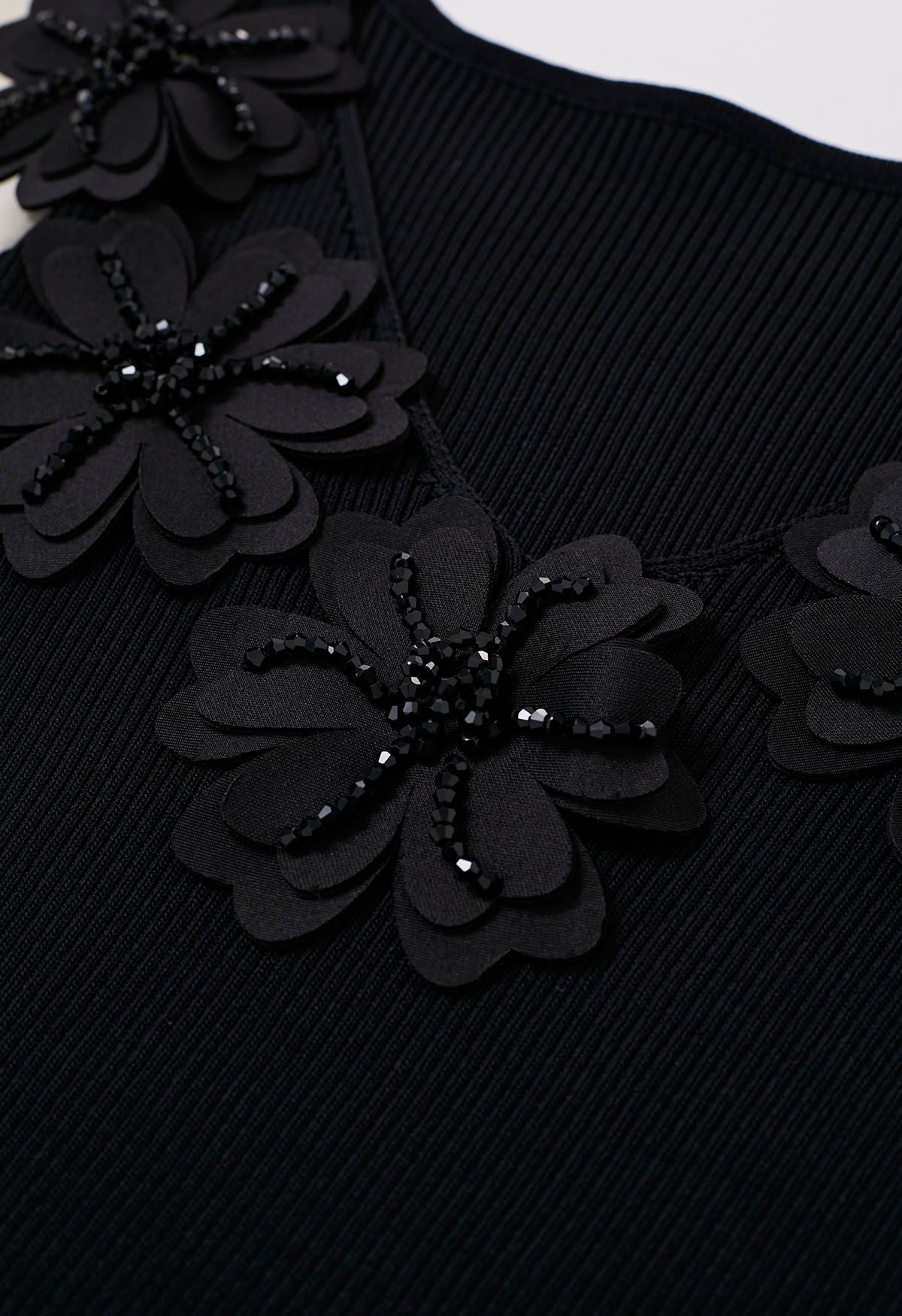 Gespleißtes Strickoberteil mit Perlen und Blumen, V-Ausschnitt und Blasenärmeln in Schwarz