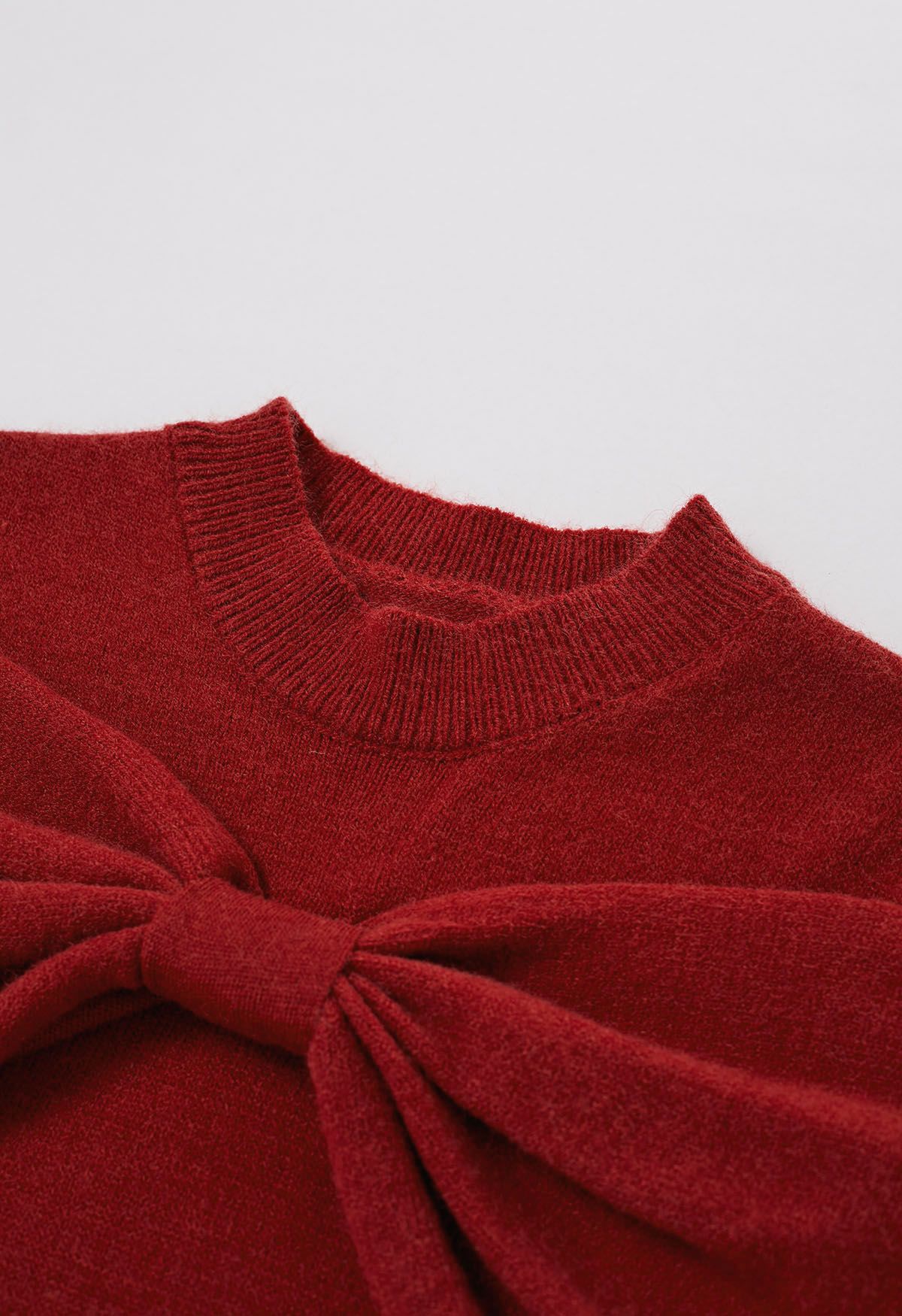 Strickpullover mit Schleife und kalten Schultern in Rot