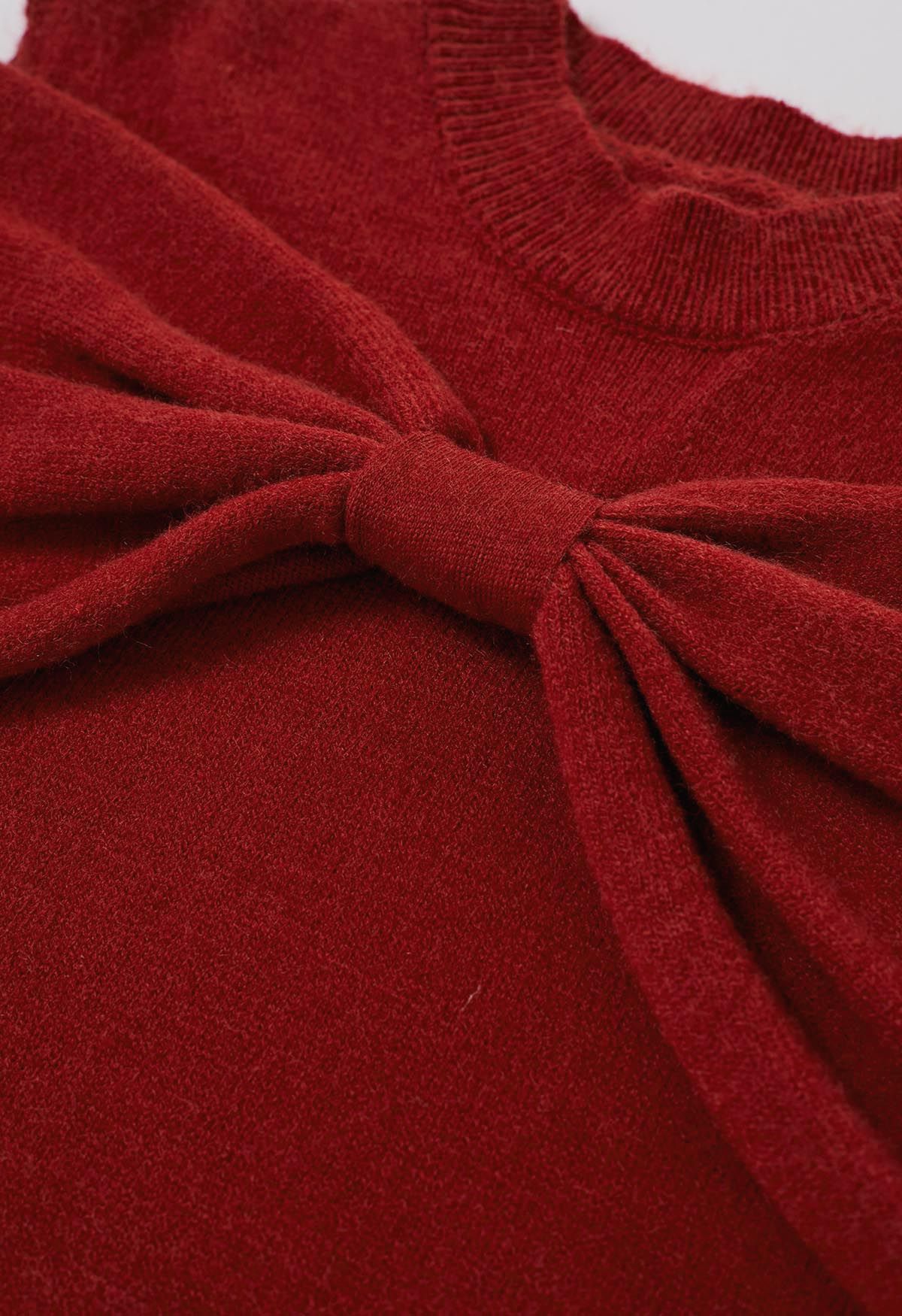 Strickpullover mit Schleife und kalten Schultern in Rot