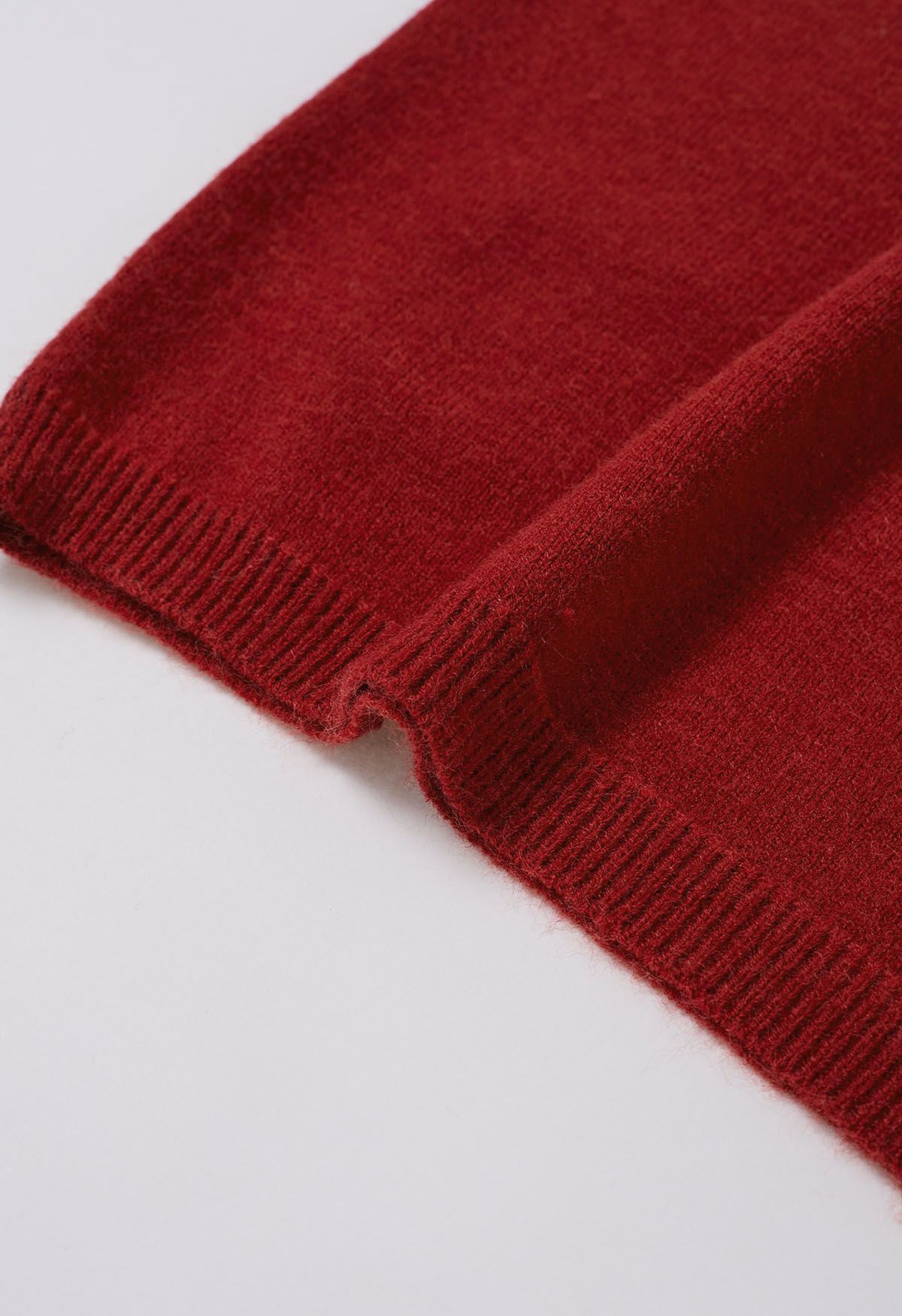 Strickpullover mit Schleife und kalten Schultern in Rot