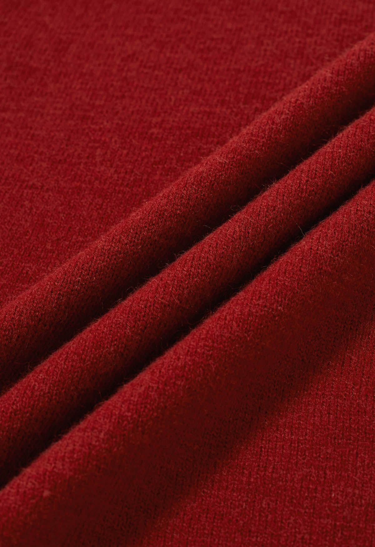 Strickpullover mit Schleife und kalten Schultern in Rot