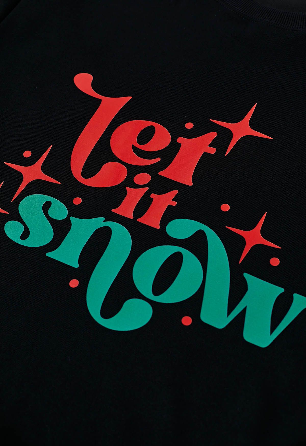 Sweatshirt mit „Let It Snow“-Print in Schwarz