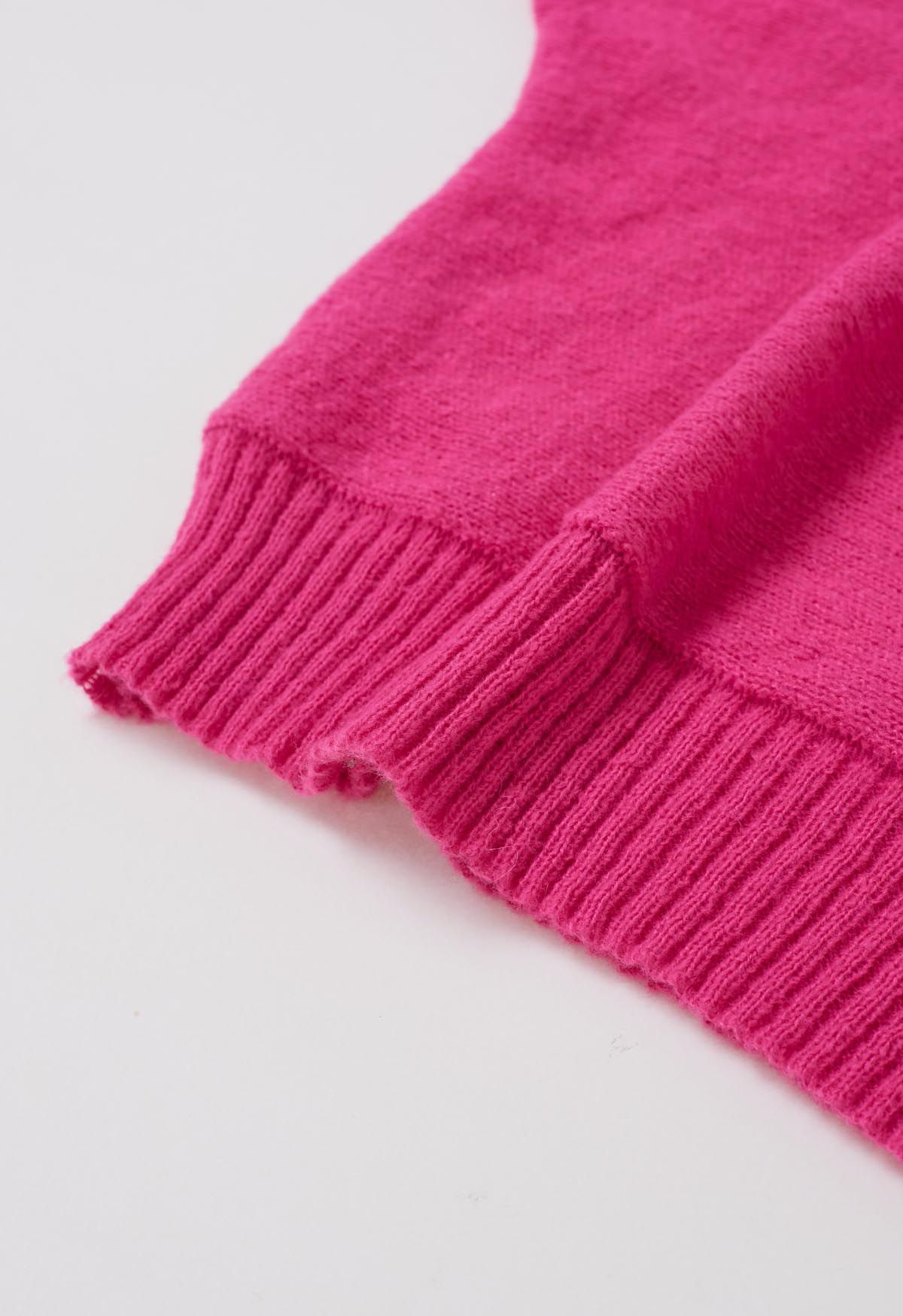 Fröhlicher Strickpullover mit Rollkragen und Fledermausärmeln in Pink