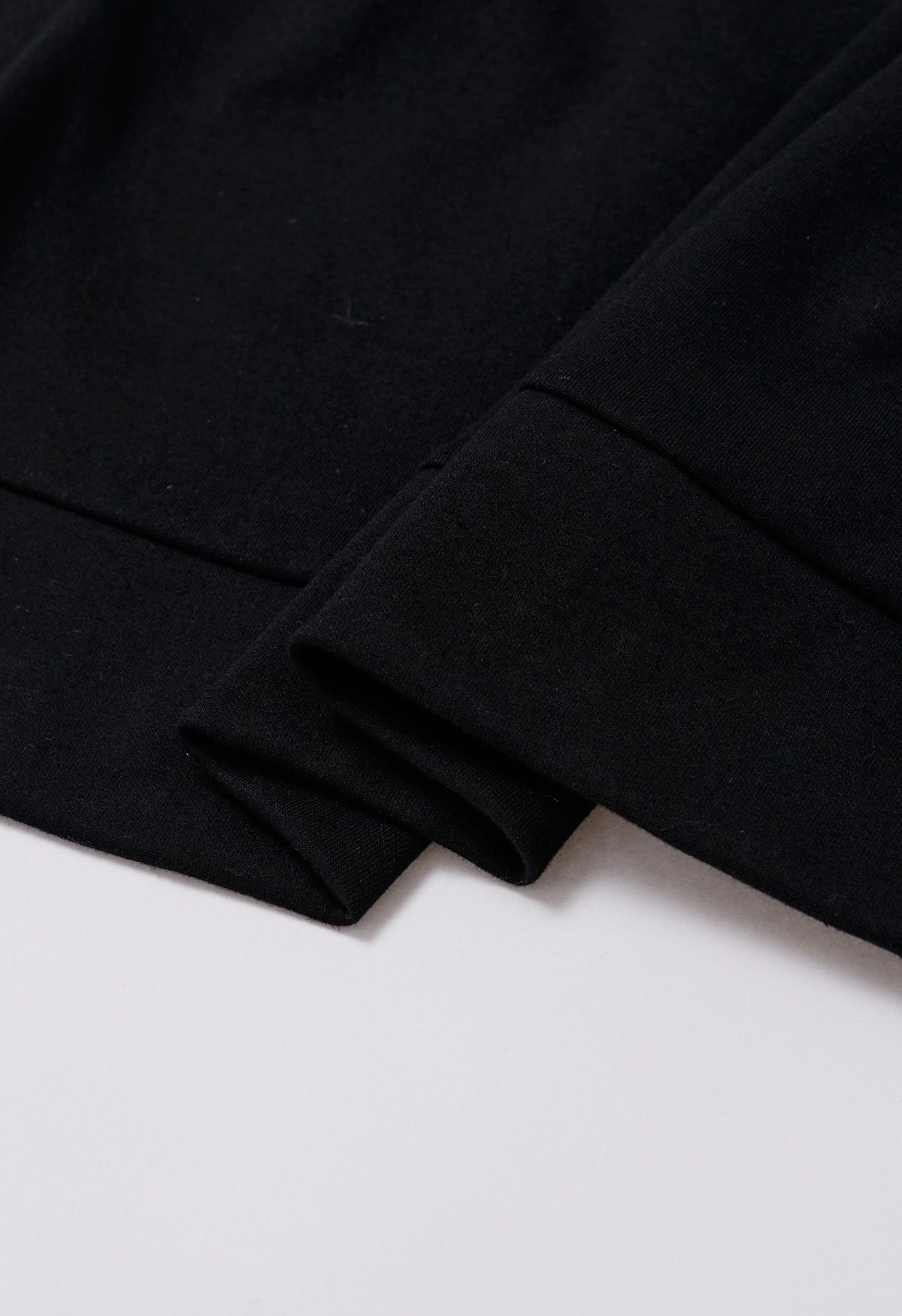 Baumwoll-Sweatshirt mit Schleife hinten in Schwarz