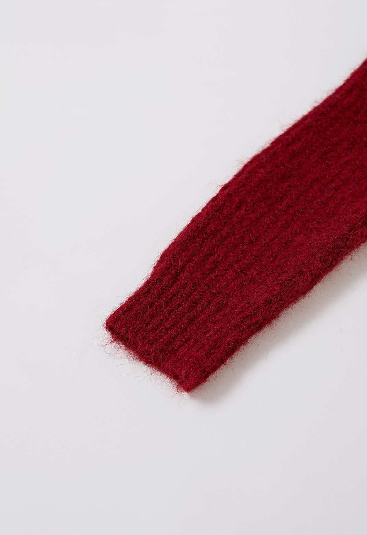 Mit Reißverschluss verzierter Fuzzy-Strickpullover in Rot