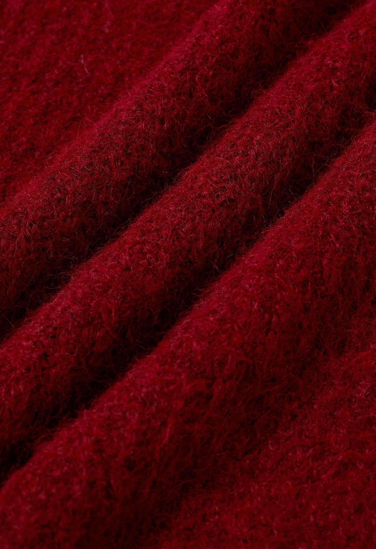 Mit Reißverschluss verzierter Fuzzy-Strickpullover in Rot