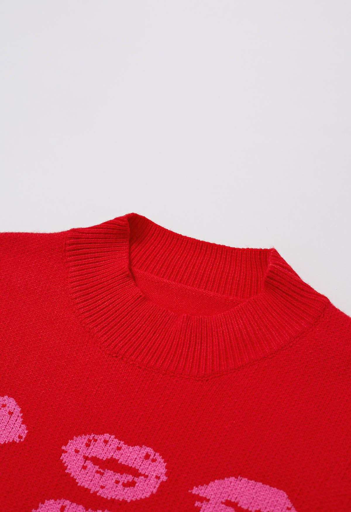 Strickpullover mit rotem Lippenmuster in Rot
