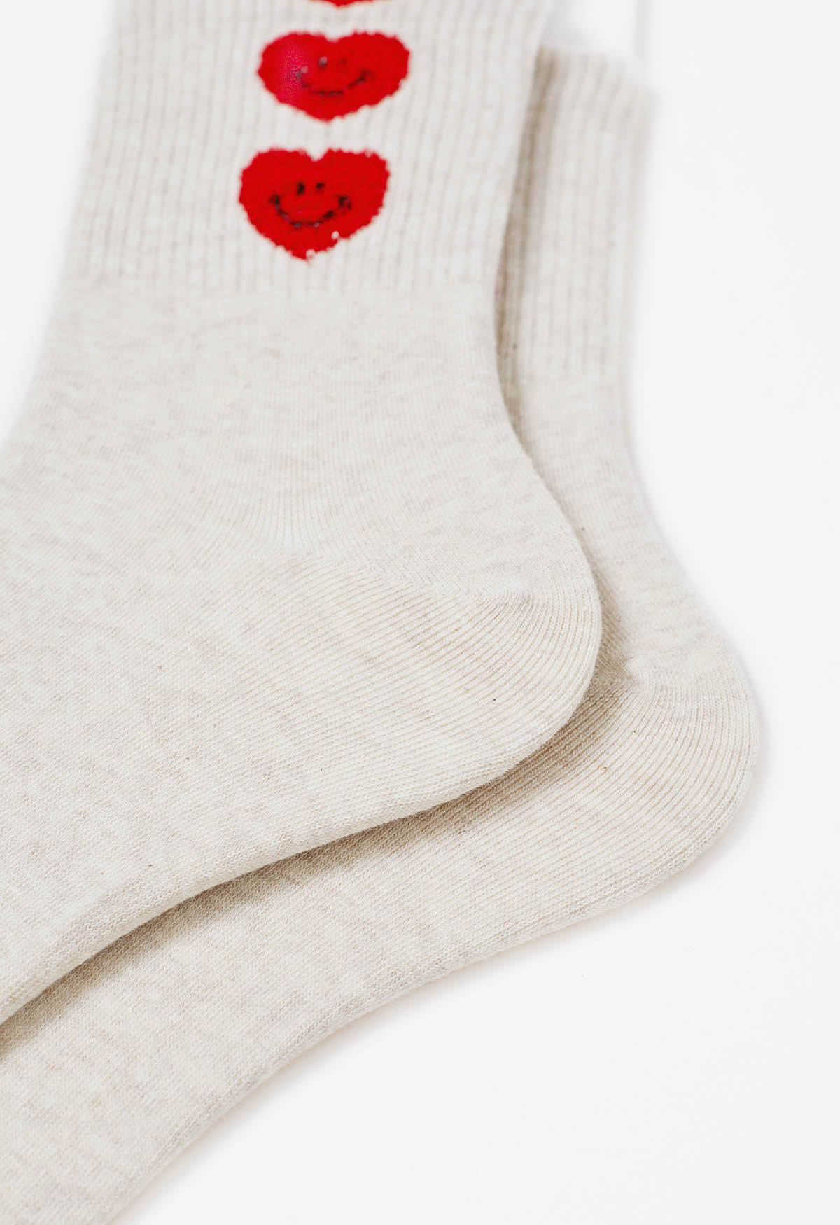 Crew-Socken aus Baumwolle mit lächelndem Gesicht und Herz