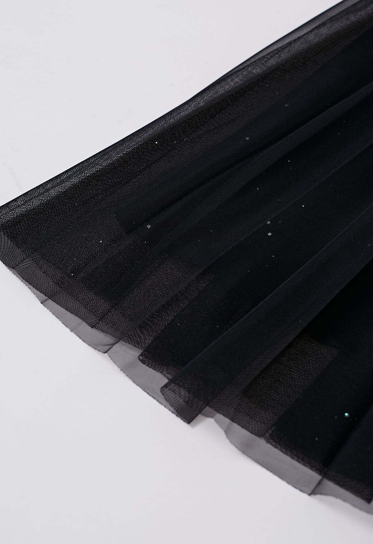 Rock aus plissiertem Mesh-Tüll mit Glitzerbesatz in Schwarz