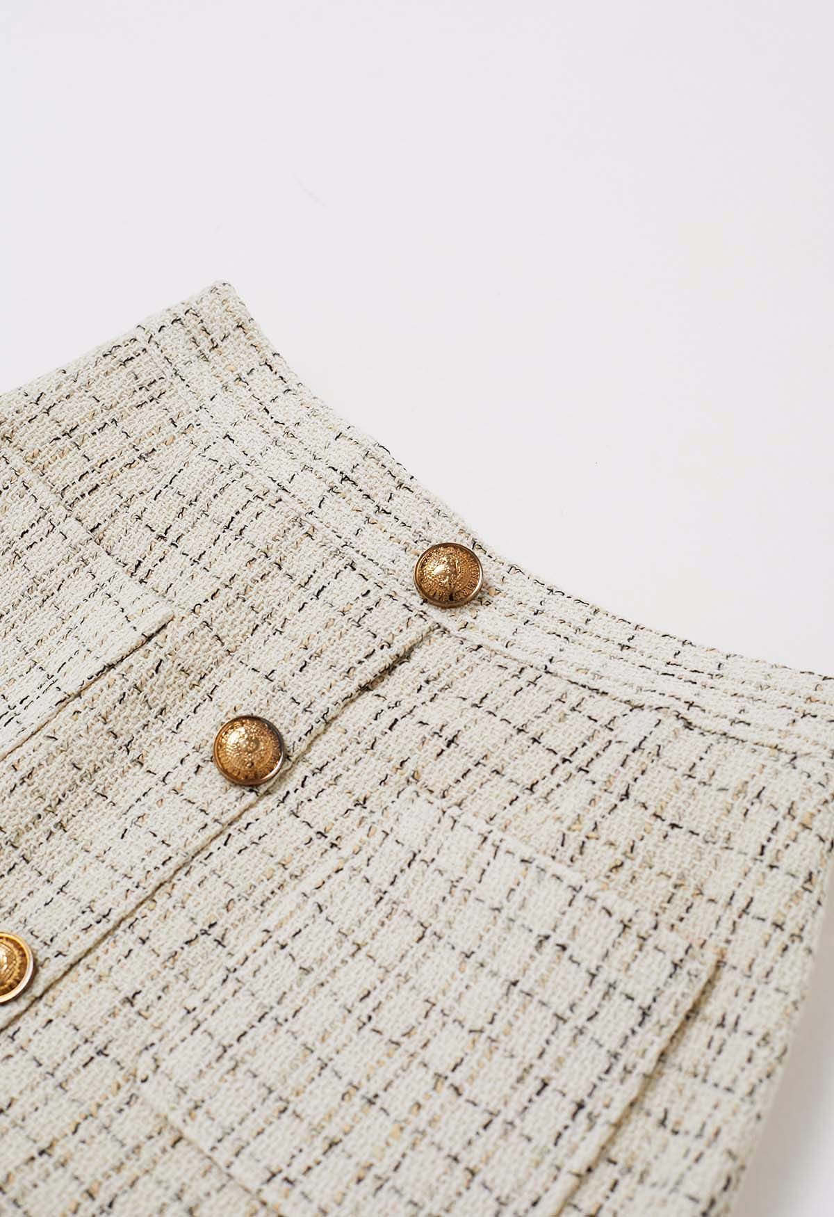 Karierter Tweed-Minirock mit goldenen Knöpfen und Taschen